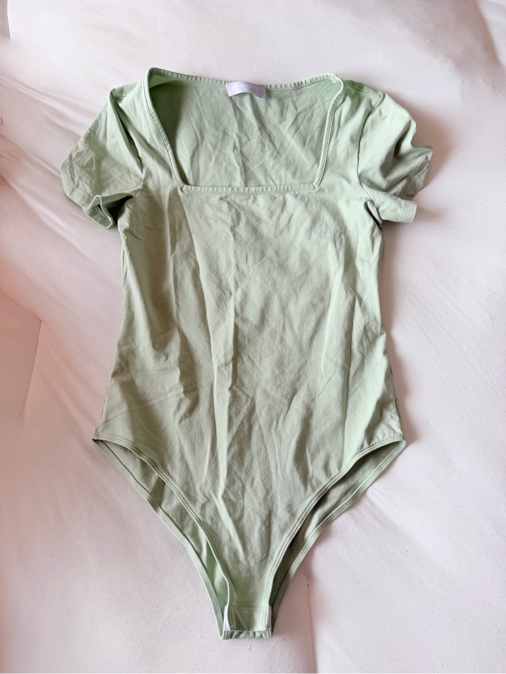 Green bodysuit